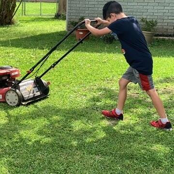 Jacob mowing the lawn