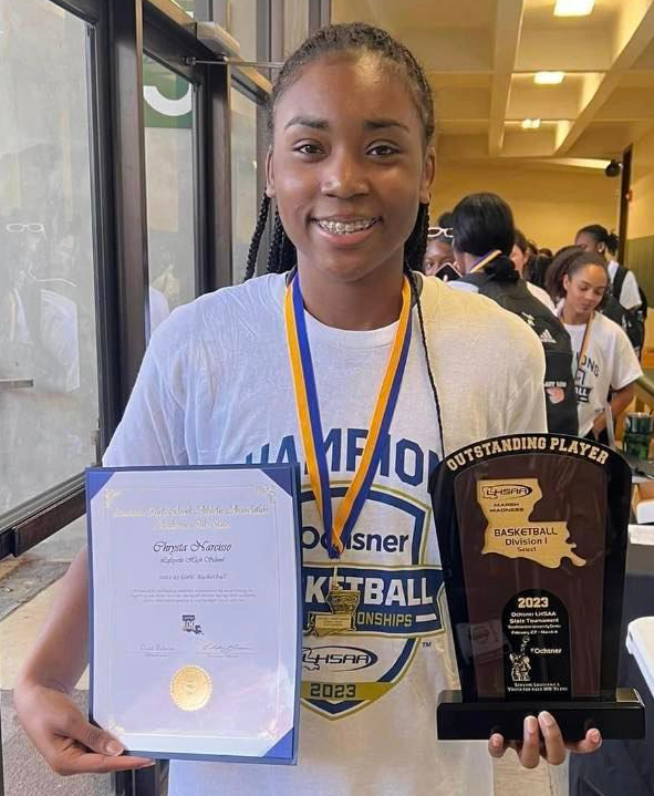 Chrysta Narcisse with awards